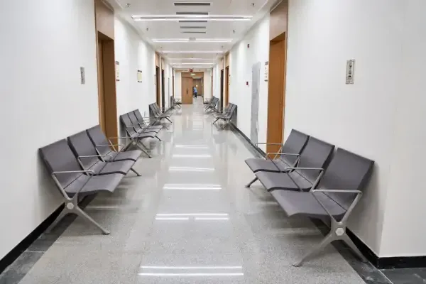 In which medical spaces are hospital folding chairs suitable for use?