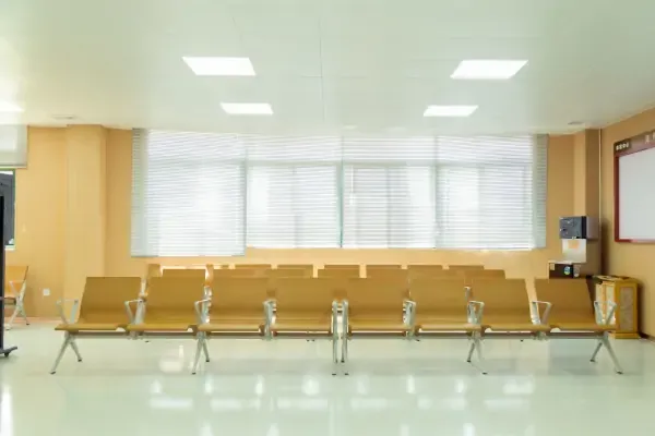 How can hospital waiting chairs improve the patient waiting experience?